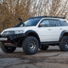 Багажник экспедиционный Mitsubishi Pajero Sport 2008-2015 шторка, дальний и рабочий свет - Багажники