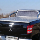 Тюнинг для MITSUBISHI L200 2019-  Защита кузова и заднего стекла 75х42 мм (для крышки) (без надписи) - Дуги в кузов