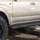 Силовые трубные пороги Toyota Land Cruiser 100, Lexus LX 470 с гидроподвеской - Силовые пороги
