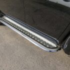 Тюнинг для MITSUBISHI L200 2019-  Пороги с площадкой 75х42 мм - Силовые пороги