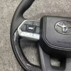 Land Cruiser 200 Руль с подогревом в стиле LC300, отделка под карбон, Airbag в комплекте - Интерьер - TOYOTA - Toyota Land Cruiser